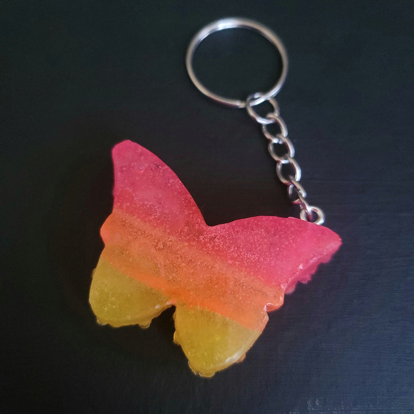 3 colour flower butterfly Resin keyring - Bubbles and imperfections - Maker's One Takers