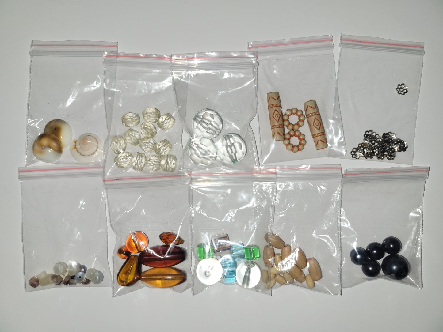 50+ random mix of recycled beads. #1