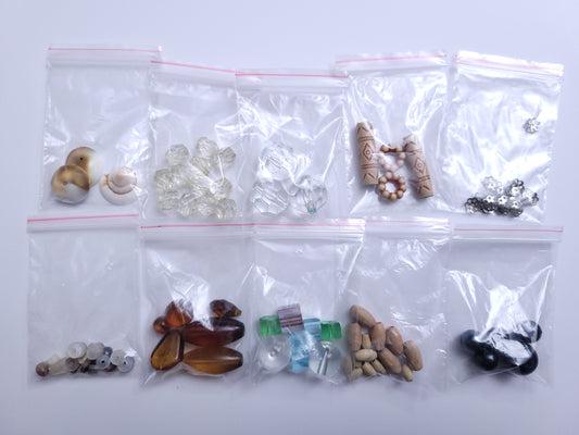 50+ random mix of recycled beads. #1