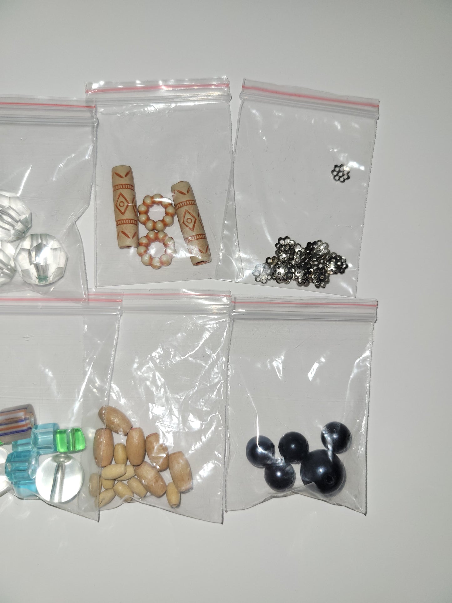 50+ random mix of recycled beads. #1