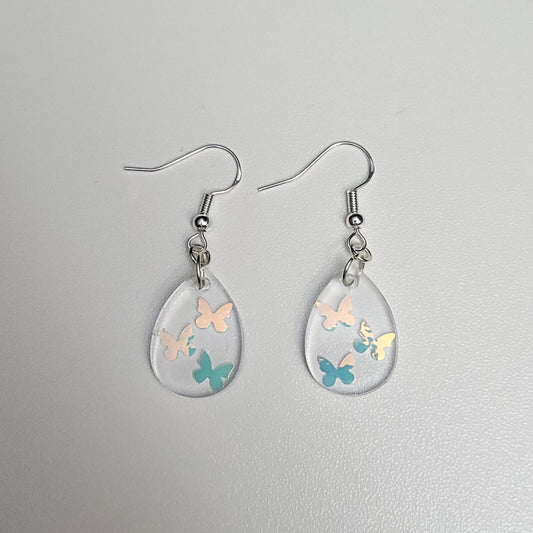 Butterfly sequins glow in the dark resin earrings - test sample - Maker's One Takers